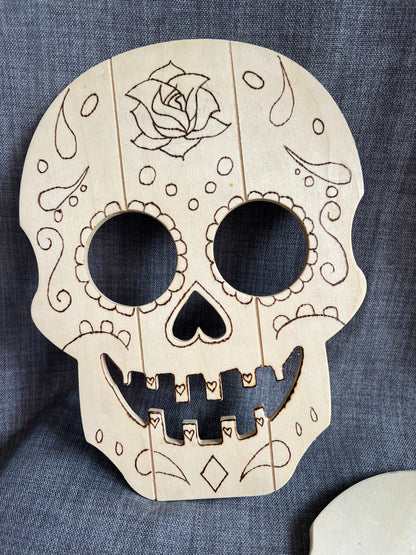 2 Wooden Skulls