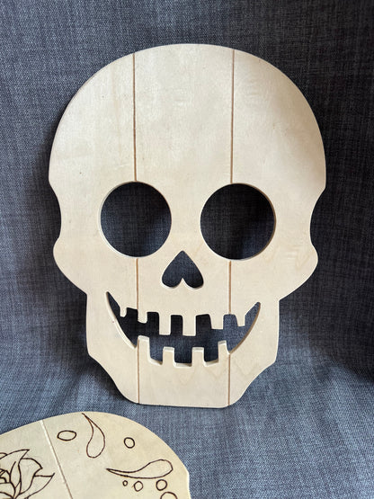 2 Wooden Skulls