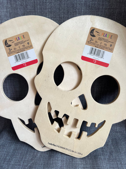 2 Wooden Skulls